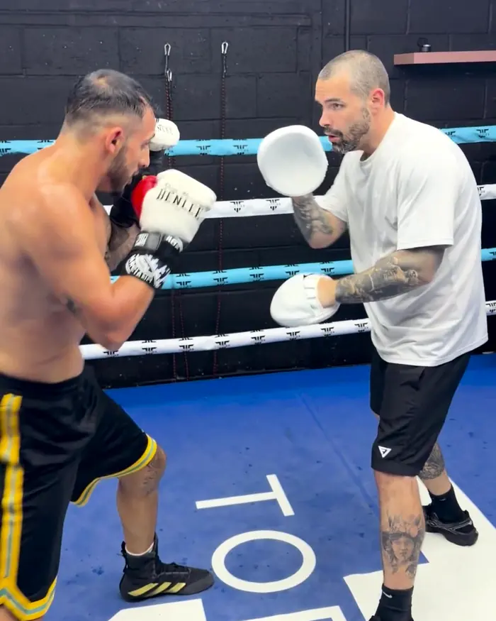 Pad work in the blue ring at Intense Boxing gym